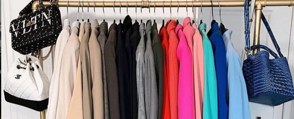 Personal stylist adjusting suit for Toronto business professional