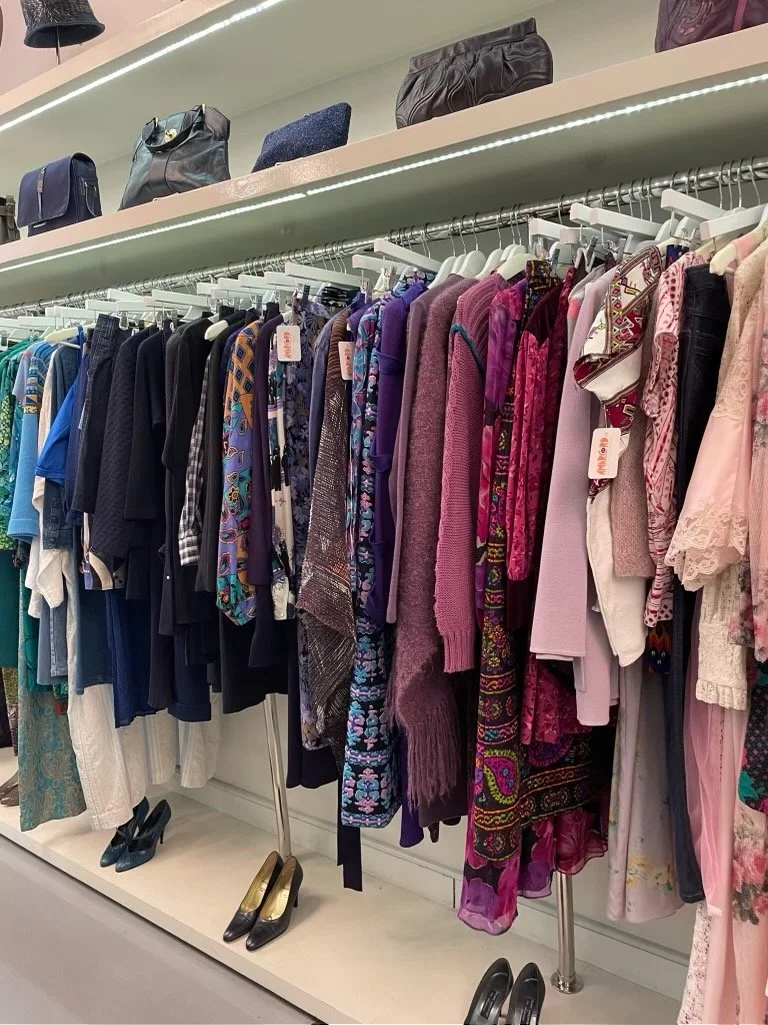 Fashion stylist in Toronto helping client choose professional wardrobe